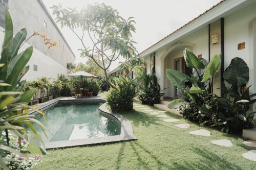 Bazén v ubytování D'Leafy Seminyak nebo v jeho okolí