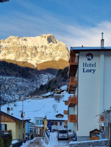 a hotel lobby with a view of a mountain at Hotel Lory - Molveno - Dolomiti in Molveno