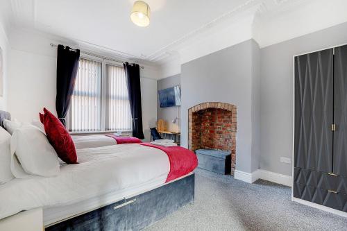 Ένα ή περισσότερα κρεβάτια σε δωμάτιο στο Spacious 3-Bed Home in South Shields, Sleeps 8