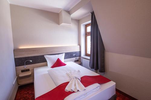Katil atau katil-katil dalam bilik di Hotel Lengenfelder Hof
