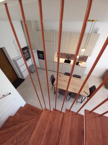 a room with a table and some chairs in it at SPA TOWN house II in Druskininkai