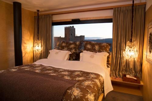 Postel nebo postele na pokoji v ubytování Casas Do Coro