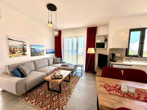 a living room with a couch and a table at DeJablue Phase 2, block T2, unit 3 in Bahçeli