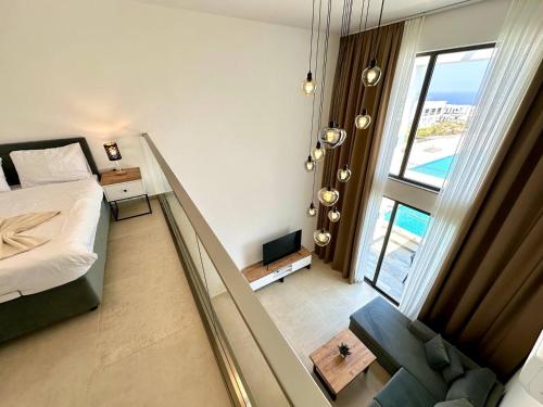 Ένα ή περισσότερα κρεβάτια σε δωμάτιο στο Deja Blue block C unit 19