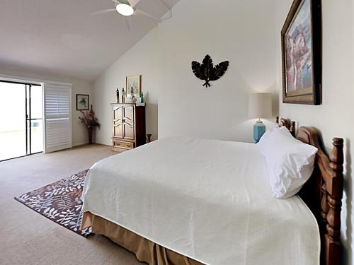 En eller flere senge i et værelse på Buena Vida Townhomes #28