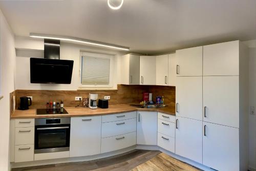 Kuchyň nebo kuchyňský kout v ubytování Quartier22 - Ferienwohnung mit Altstadtblick