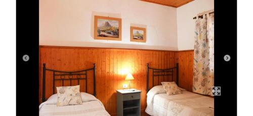 Postel nebo postele na pokoji v ubytování Casa Rural con hermosas vistas