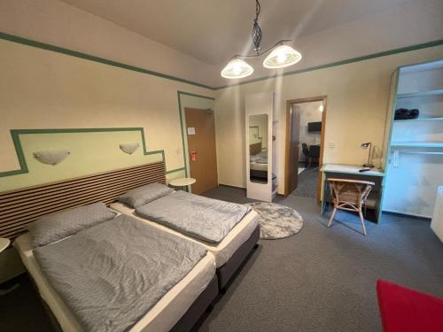 Postel nebo postele na pokoji v ubytování Apartments Starlight Hotel Wiesmann