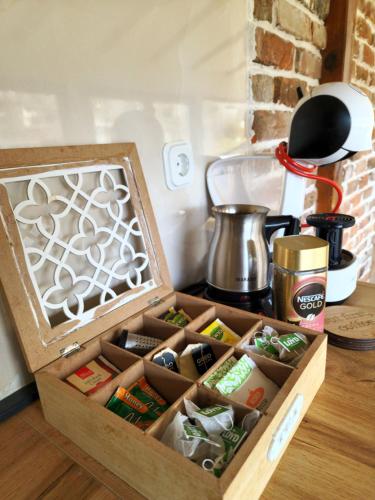 a wooden box filled with different types of food at Villa Beti in Mavrovo