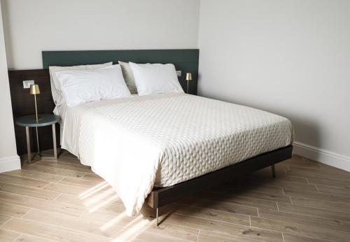 Cama o camas de una habitación en Petrus Rooms