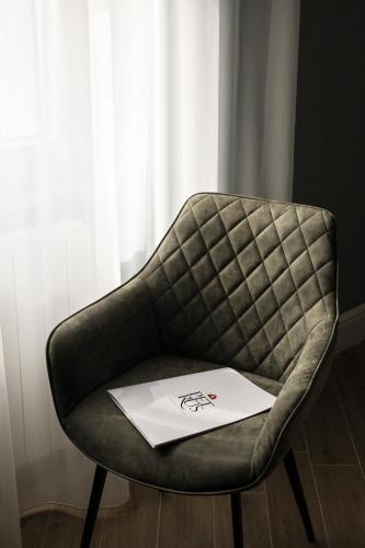 Zona de estar de Petrus Rooms
