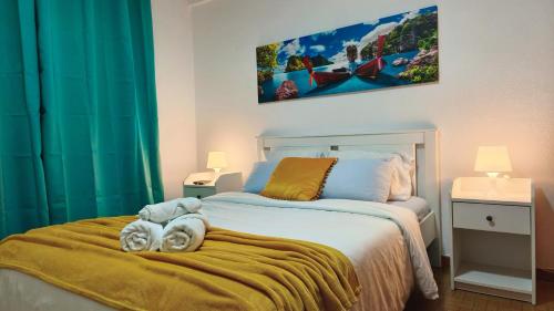 Ένα ή περισσότερα κρεβάτια σε δωμάτιο στο The Whale Beach House
