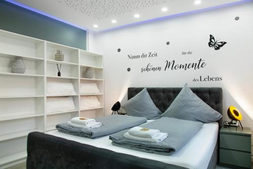Кровать или кровати в номере Modern Apartments Neuburg 1 - New