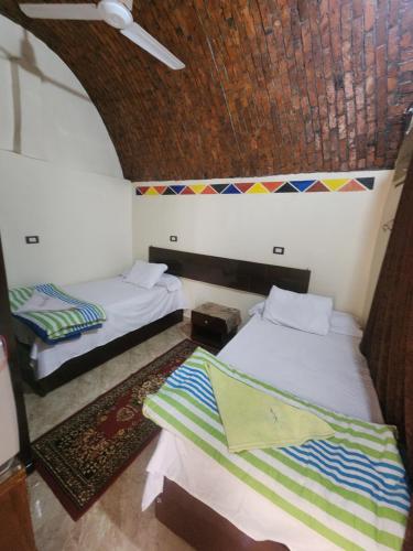 Postel nebo postele na pokoji v ubytování Dara guest House