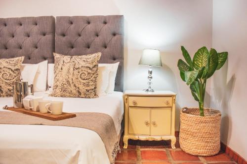 Ένα ή περισσότερα κρεβάτια σε δωμάτιο στο Olive Tree Lodge