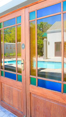 Πισίνα στο ή κοντά στο Olive Tree Lodge