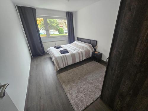 Photo de la galerie de l'établissement Charmant Appartement Moderne 71m2 à Illzach - Mulhouse - Parking gratuit, à Illzach