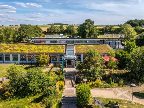 an overhead view of a building with a garden at Dresdner Tor Süd in Wilsdruff