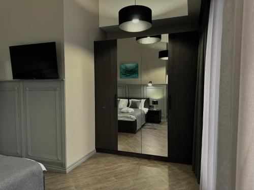 Ein Bett oder Betten in einem Zimmer der Unterkunft Aqvium