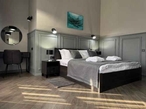 Ein Bett oder Betten in einem Zimmer der Unterkunft Aqvium