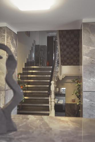 a view of a staircase in a house at Amir Deluxe Motel in Schönefeld