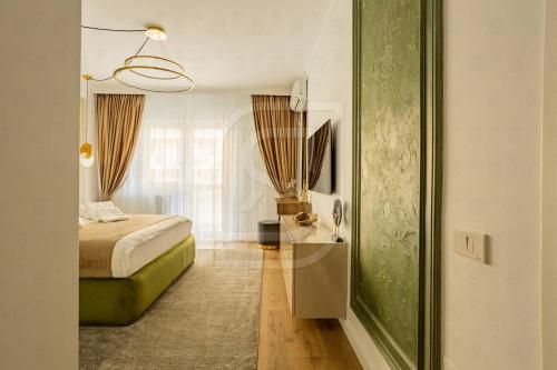 a bedroom with a bed and a window at Atlas by Kristal Collection in Bucharest