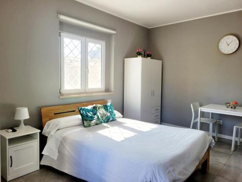 Posteľ alebo postele v izbe v ubytovaní Diamond Suite Fiumicino Casa vacanze