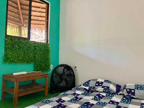 Postel nebo postele na pokoji v ubytování Tiny house