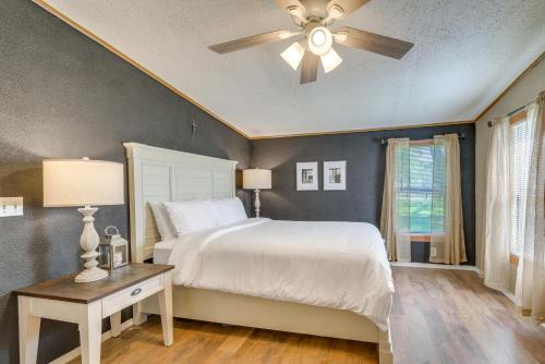a bedroom with a bed and a ceiling fan at Pet-Friendly Ocala Vacation Rental with Patio! in Ocala