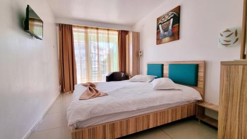 Postel nebo postele na pokoji v ubytování Hotel Fortuna