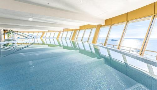 a swimming pool on the top of a cruise ship at Intempo by Holuxe - 292 -29th floor in Benidorm
