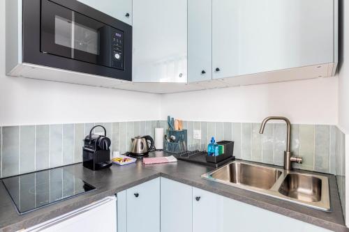 Η κουζίνα ή μικρή κουζίνα στο GuestReady - Charming Stay near Paris