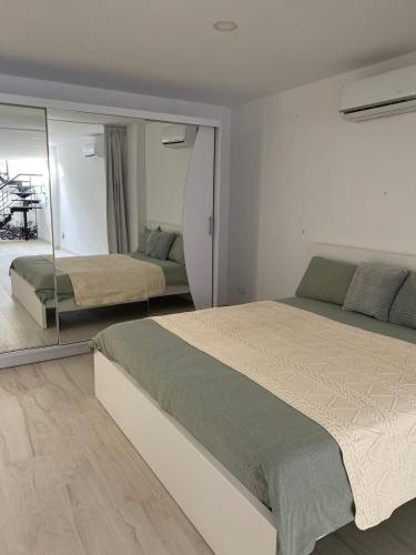 New - MiJa basement Loft Apartment steps from Beach - perfect for Sun and Sport Seekers photo 18