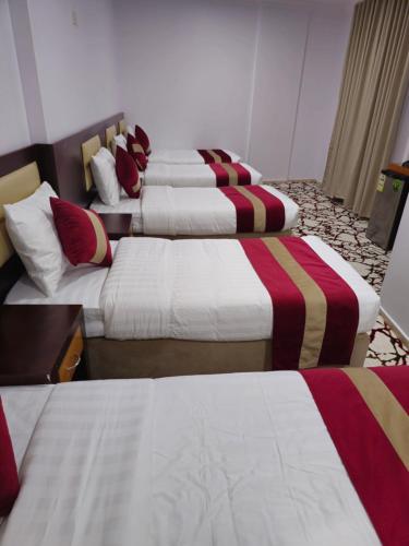 Postel nebo postele na pokoji v ubytování Ajyal Al Madina Hotel 3