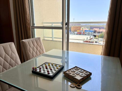 Χώρος καθιστικού στο Apartamento com varanda 9 min da praia na Cohama