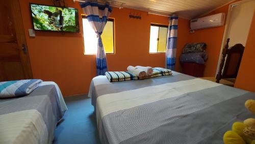 Postel nebo postele na pokoji v ubytování Hospedaje Encarnación