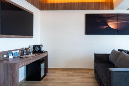 Una televisión o centro de entretenimiento en Radisson Puebla Angelopolis