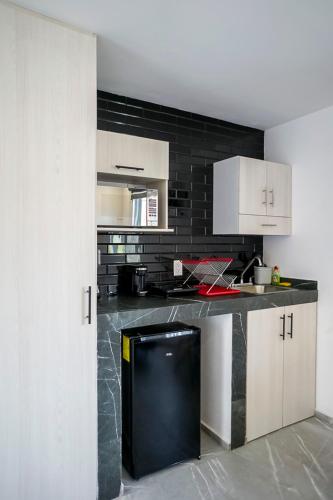 Η κουζίνα ή μικρή κουζίνα στο Lofts Arsénico