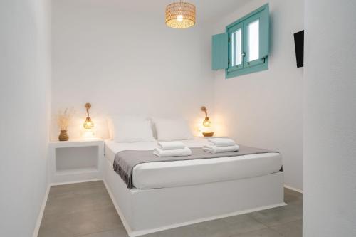 Letto o letti in una camera di Ploes Seaside Houses