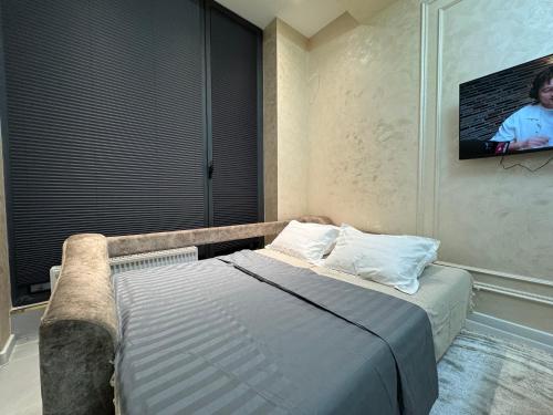 Llit o llits en una habitació de Modern Spaces 6