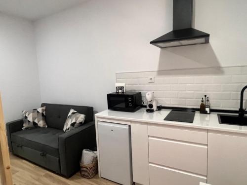 Kuchyň nebo kuchyňský kout v ubytování Apartamento catedral
