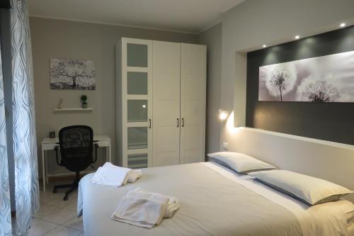 Katil atau katil-katil dalam bilik di Appartamento - Rho Easy Home