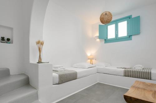 Letto o letti in una camera di Ploes Seaside Houses