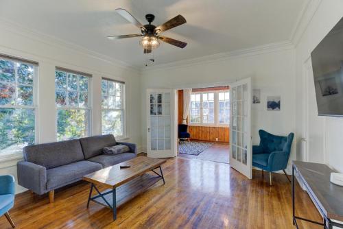 a living room with a couch and a table at The Wilsonia in Memphis