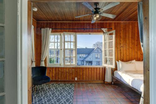 a bedroom with a bed and a window at The Wilsonia in Memphis