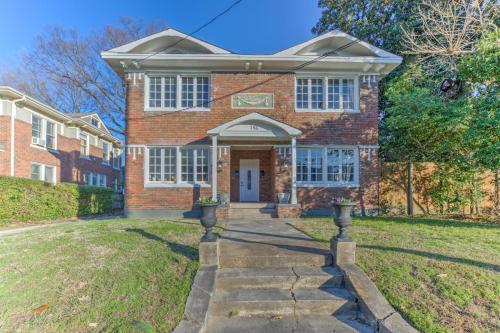 a brick house with a stone walkway to the front door at The Wilsonia in Memphis
