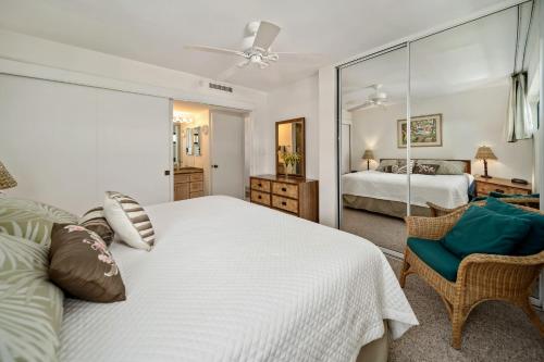 Postel nebo postele na pokoji v ubytování Sugar Beach 316 Front Row Ocean Views in Beautifully Upgraded Beachfront Condo