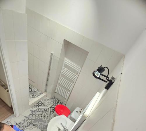 a bathroom with a shower and a toilet in it at Stanford Aparthotel Gara de Nord in Bucharest