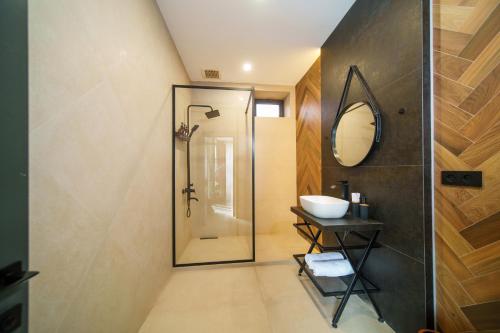 a bathroom with a shower and a sink at Dili Dream Villa in Dilijan