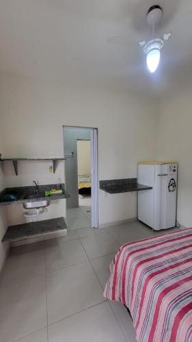 Η κουζίνα ή μικρή κουζίνα στο Pousada em Matinhos